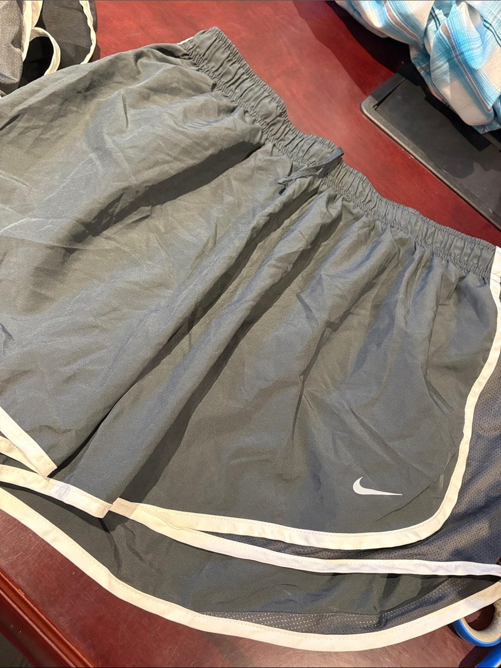 Nike Women's Gray Athletic Shorts with White Trim and Swoosh